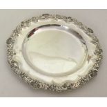 A good quality silver plate with scroll border. Lo