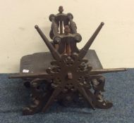 An unusual brass mounted printing press decorated