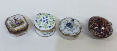 A Limoges snuff box decorated with flowers togethe