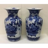 A tall pair of Japanese blue and white vases with