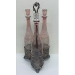 An attractive Victorian red glass tantalus with vi