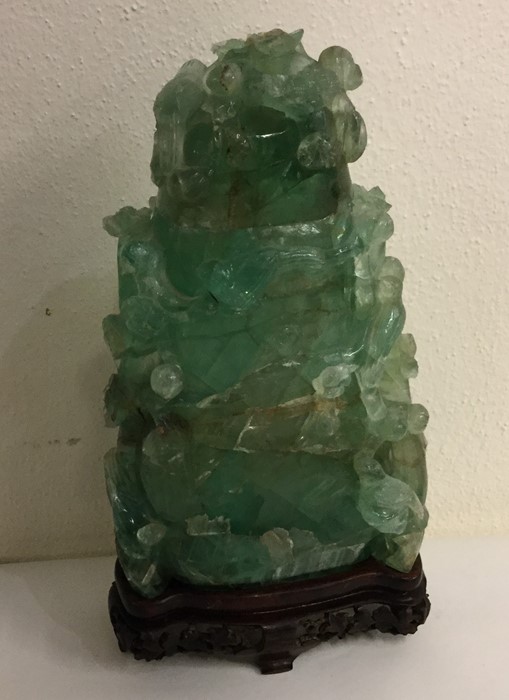 A large rock crystal vase and cover of carved form