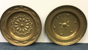 A good pair of brass circular Arm's dishes / charg