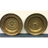 A good pair of brass circular Arm's dishes / charg