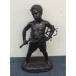 A large spelter figure of a child in standing posi