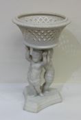 A tall paragon planter on shaped base. Approx. 37