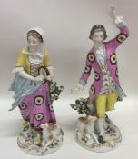 A pair of attractive and decorative porcelain figu