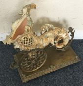 An unusual large brass cornucopia shell mounted wi