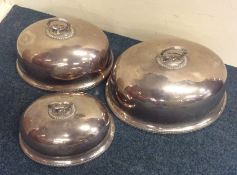 A group of three graduated EPNS meat domes. Est. £