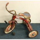 A vintage child's Raleigh tricycle with painted bo