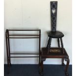 A carved oak hall chair together with a stool and