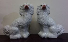 A pair of Staffordshire dogs of typical design. Es