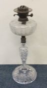 A large attractive cut glass oil lamp with matchin