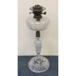 A large attractive cut glass oil lamp with matchin