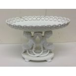 An attractive porcelain centrepiece decorated with