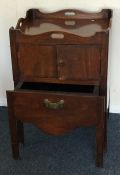 A Georgian mahogany two door commode. est. £30 - £