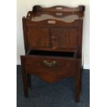 A Georgian mahogany two door commode. est. £30 - £