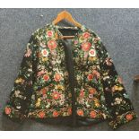 An Oriental style jacket with extensive floral emb