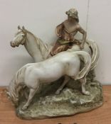 A massive Royal Dux figure of horses and rider on