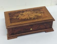 An attractive 20th Century music box with hinged l