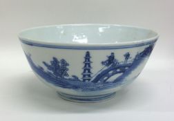 A Chinese blue and white bowl decorated with scene