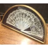 An attractive framed, glazed and mounted fan with