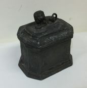 A good Antique lead tea caddy with lion finial. Es