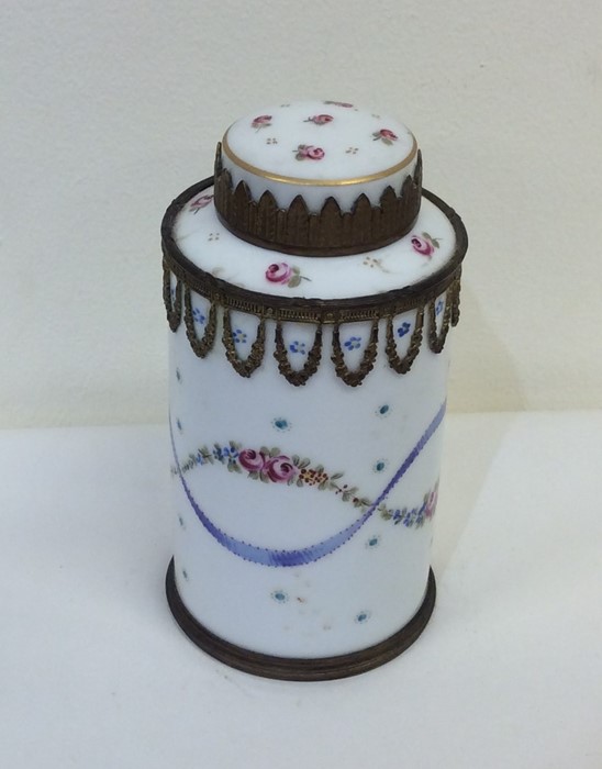 A French cylindrical tea caddy decorated with swag