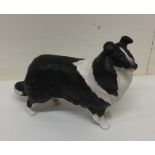 A Beswick figure of a Collie dog with bushy coat.