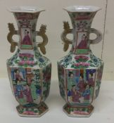 A good pair of Canton vases with gilt decoration.