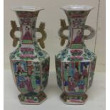 A good pair of Canton vases with gilt decoration.