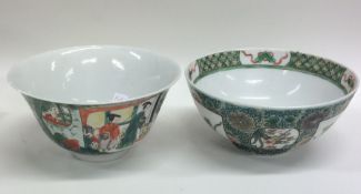 Two Chinese decorated bowls on pedestal feet. Est.