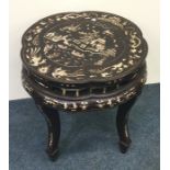 A Chinese ivory inlaid jardiniere stand decorated
