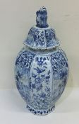 A Dutch blue and white vase and cover decorated wi