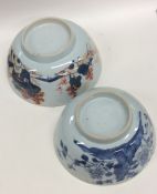 A Chinese blue and white fruit bowl with floral de