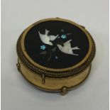 A circular brass pietra dura jewellery box with hi