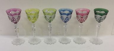 A good set of six hobnail cut glasses on shaped ba