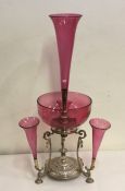 An attractive cranberry glass epergne on plated ba