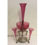 An attractive cranberry glass epergne on plated ba