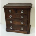 An attractive flame mahogany apprentice chest with