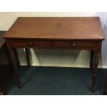 A Victorian mahogany two drawer desk. Est. £20 - £