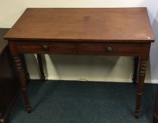 A Victorian mahogany two drawer desk. Est. £20 - £