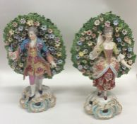 A good pair of Continental porcelain figures with