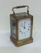 A good brass repeating carriage clock in leather t