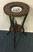 An attractive Continental rosewood veneered table