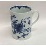 An early English Worcester mug with floral decorat