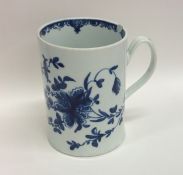 An early English Worcester mug with floral decorat