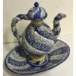 A stylish Majolica ewer on matching stand. Approx.