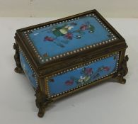A French porcelain decorated jewellery box with br