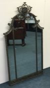 A large triple mirror attractively decorated with